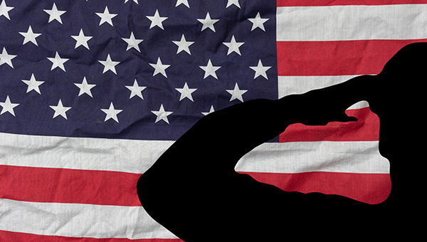 Table top view aerial image of 4th July independence day holiday background concept.Flat lay soldier saluting on USA flag wallpaper for sign of season.Free space for creative design content.