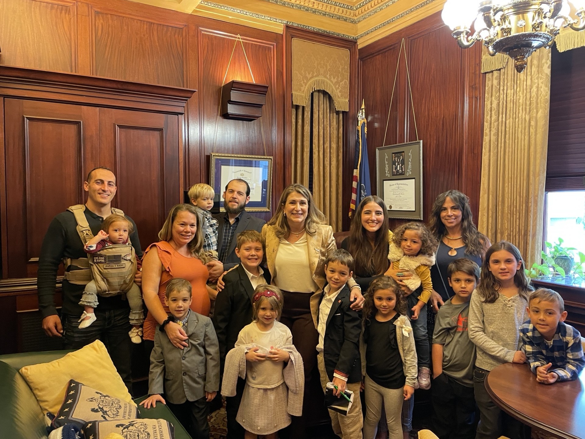Sen. Rosemary Brown poses in her Harrisburg office with a large group of homeschool students who came to visit her in the Capitol.